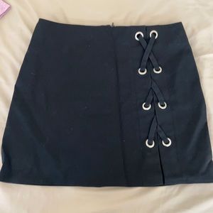 by the way. medium black tight mini skirt